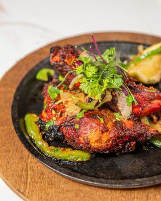 Aroma Indian Bistro signature dishes Butter ChickenAloo GobiTandoori Chicken